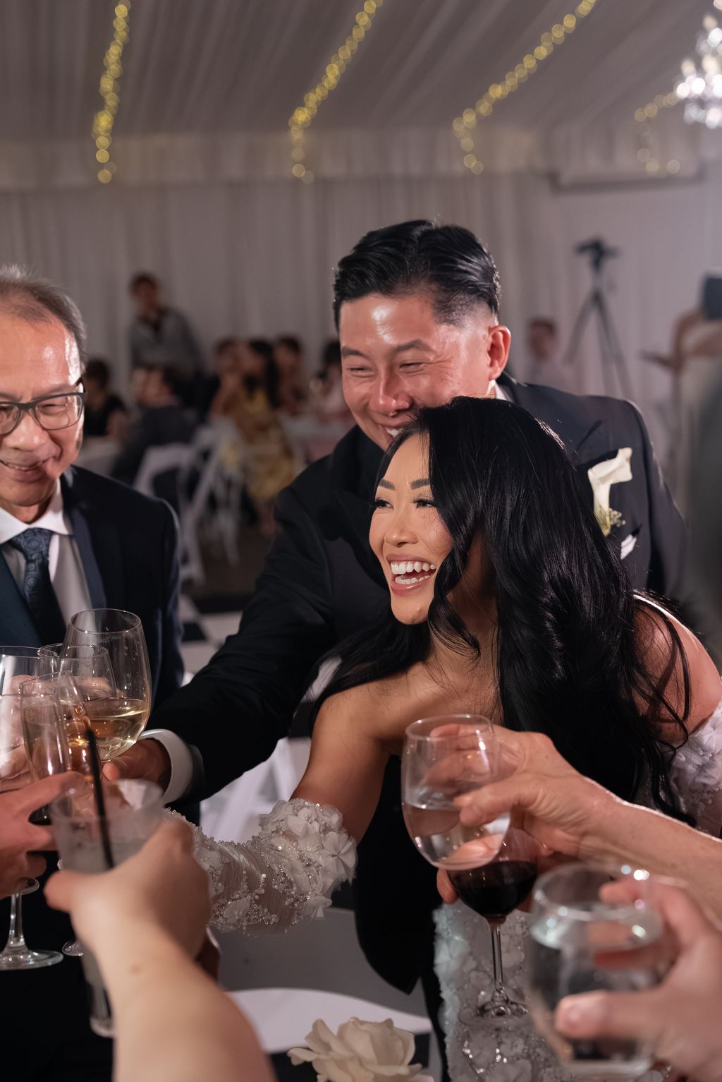 Guests toasting together at a festive reception
