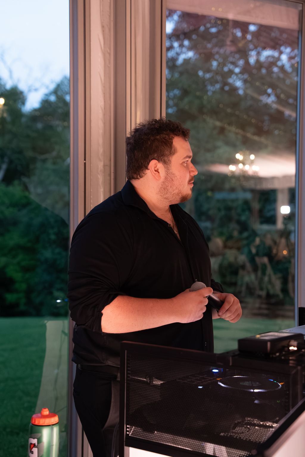 DJ overseeing the reception from the booth